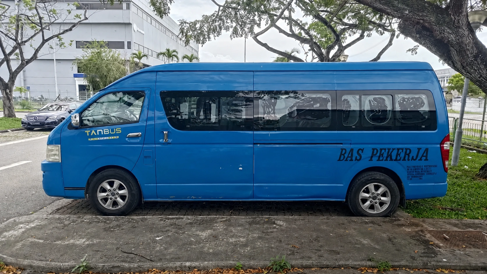 TANBUS blue employee transport van