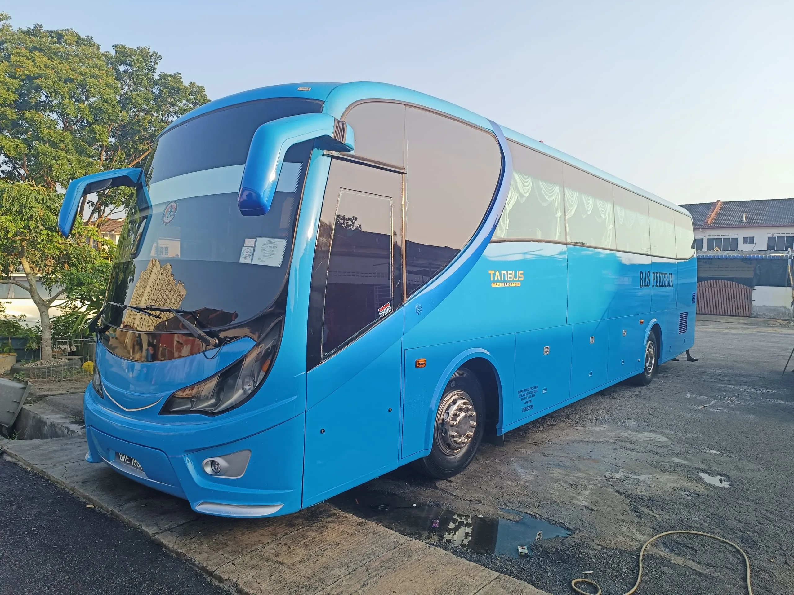 TANBUS blue employee transport coach